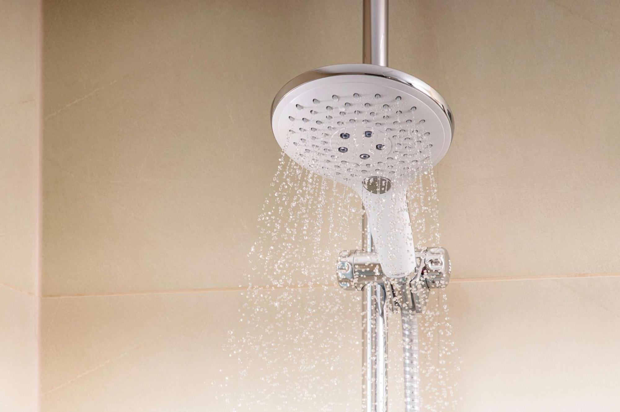 Nh Collection Bogota Andino Royal Hotel Kültér fotó A shower in operation
